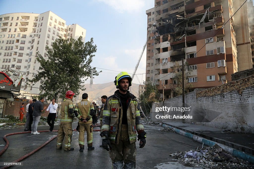 A view of a damaged building in the Iranian capital, Tehran, following an Israeli attack, on June 13, 2025. Firefighting teams are dispatched to the area. Israeli Defense Minister Israel Katz has announced that Israel conducted strikes on Iran. (Photo by Fatemeh Bahrami/Anadolu via Getty Images)