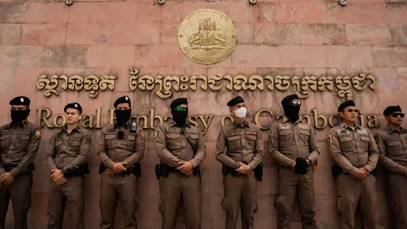 Thai police stand guard outside Cambodia's embassy in Bangkok during a demonstration over tensions at the Thai-Cambodian border